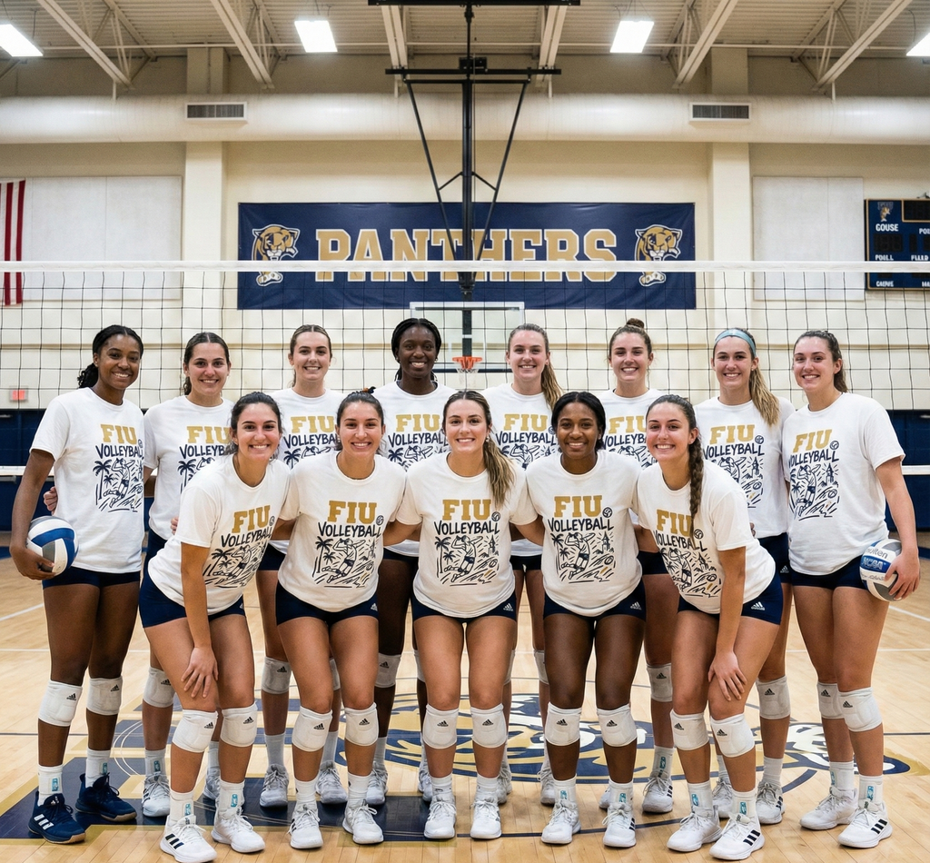 Volleyball team posing on a court with 'Panthers' banner in the background