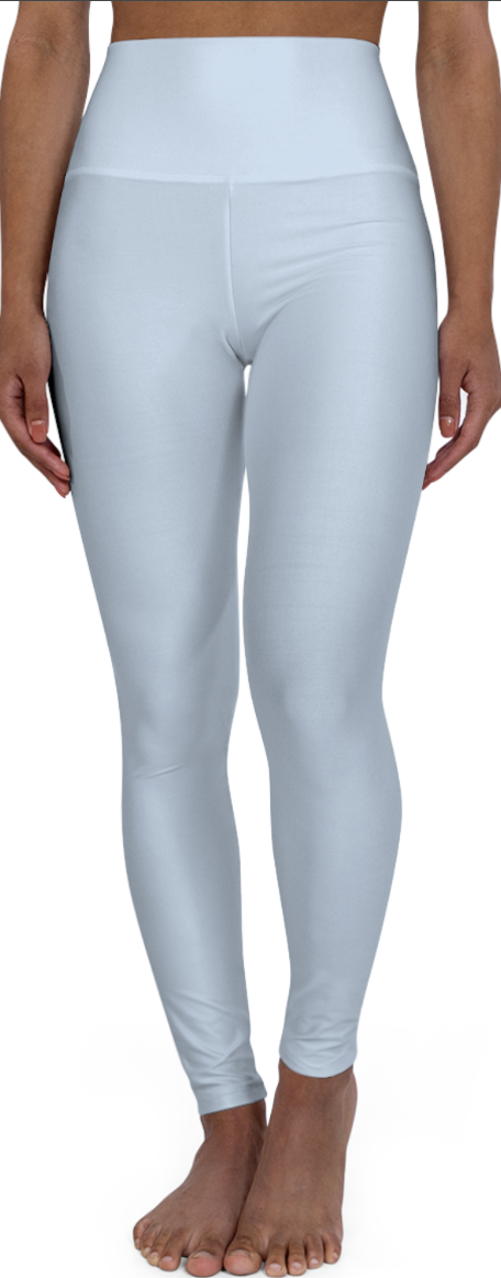 Light blue leggings worn by a person on a white background