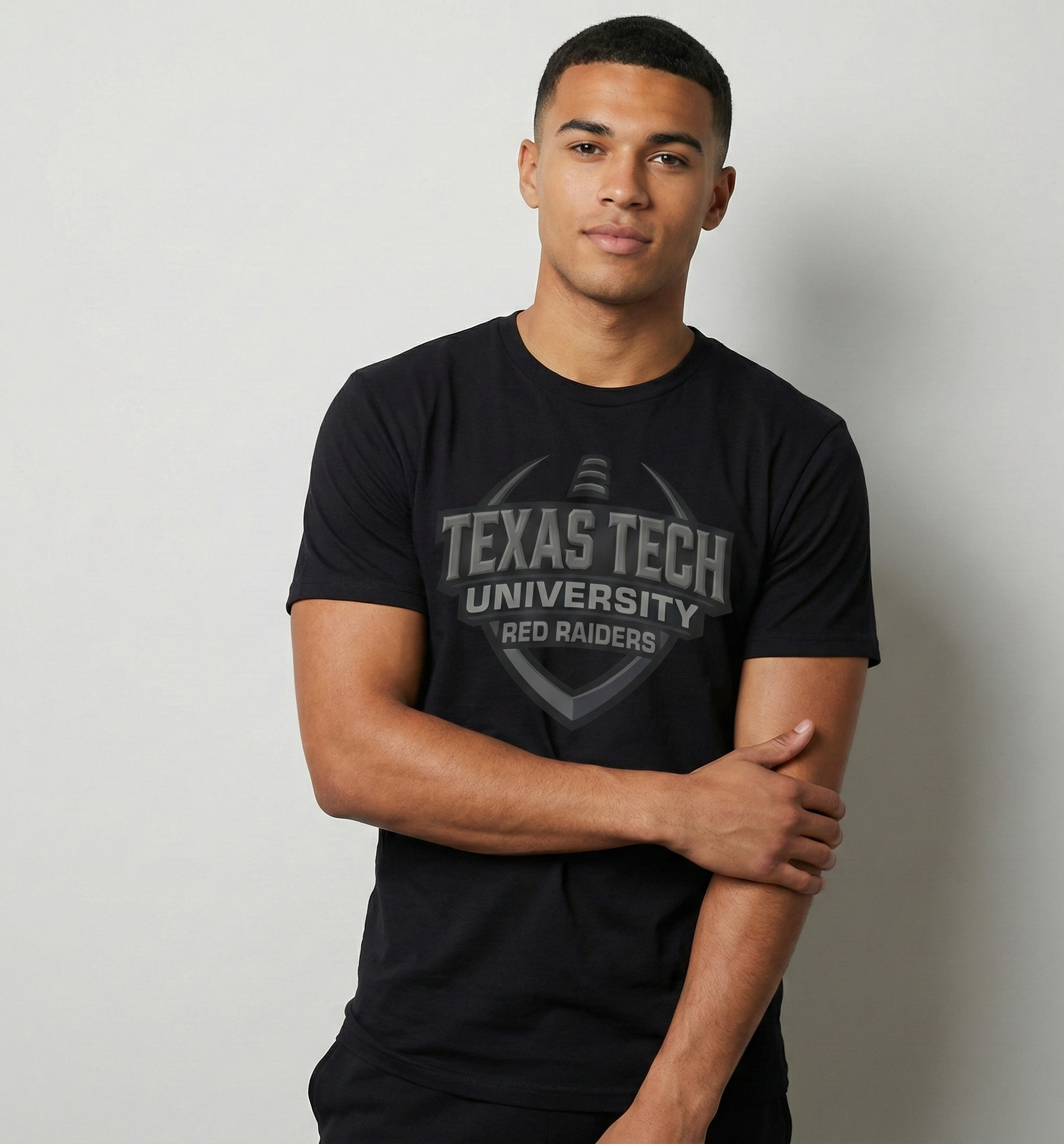 Person wearing a black Texas Tech University t-shirt against a plain background
